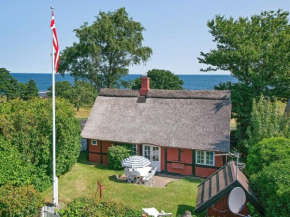 Отель Picturesque Seaside Holiday Home in Svaneke with Terrace  Сванеке 